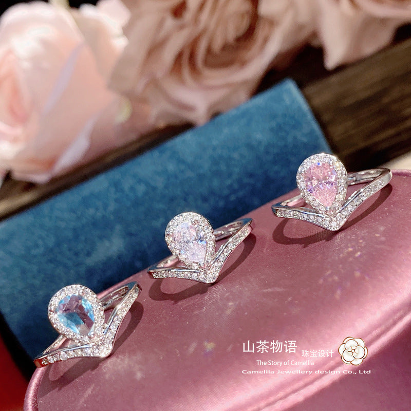 Camellia简约仿海蓝托帕戒指女 镀金微镶满钻水滴冲冠引流食指戒