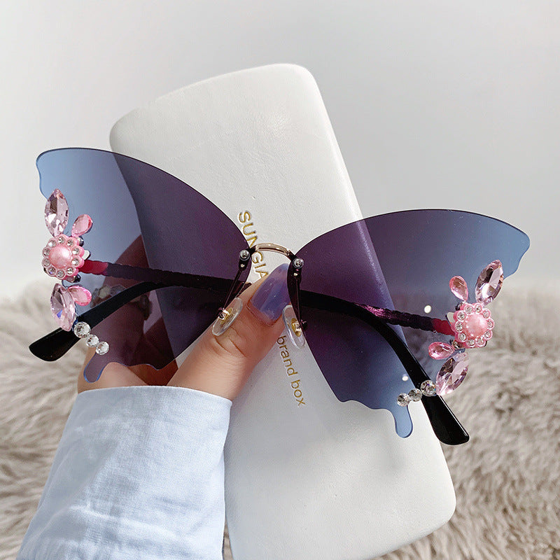 Women's fashion glasses 欧美跨境新款舞会蝴蝶形状镶钻无框太阳镜女夸张墨镜女圆脸大脸