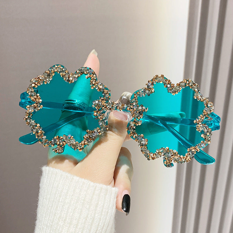 Women's fashion glasses 新款跨境镶钻透明果冻色四叶草太阳镜男女士墨镜欧形连体水钻眼镜