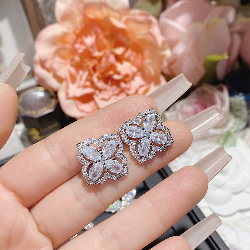 山茶直播货源热卖仿莫桑钻耳钉 镀18K金波光粼粼玫瑰花朵女神耳饰
