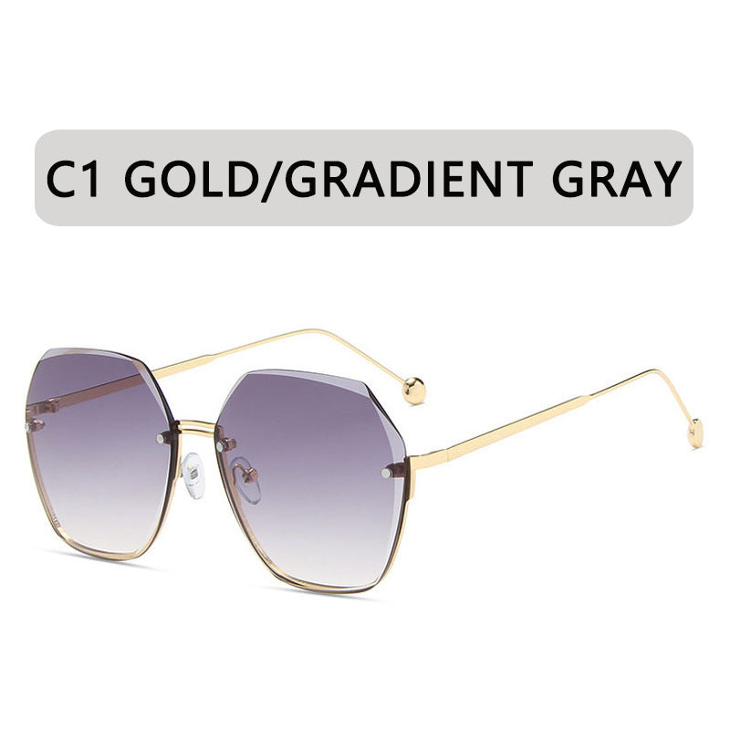 Women's fashion glasses 2024 新款跨境大框金属无框太阳镜欧美多边形切边海洋片女士墨镜