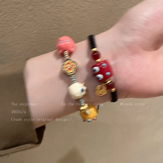 童趣可爱怪兽编织手链女ins小众设计高级感手饰网红闺蜜手绳批发