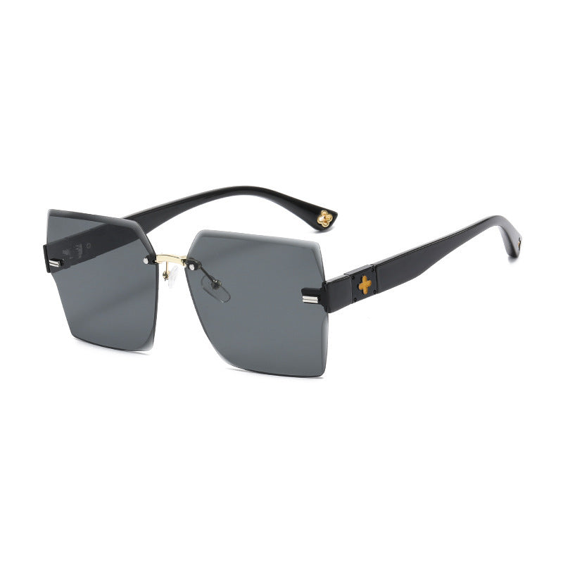 Women's fashion glasses 跨境新款四叶草女士太阳镜潮流抖音无框切边墨镜时尚开车旅游眼镜