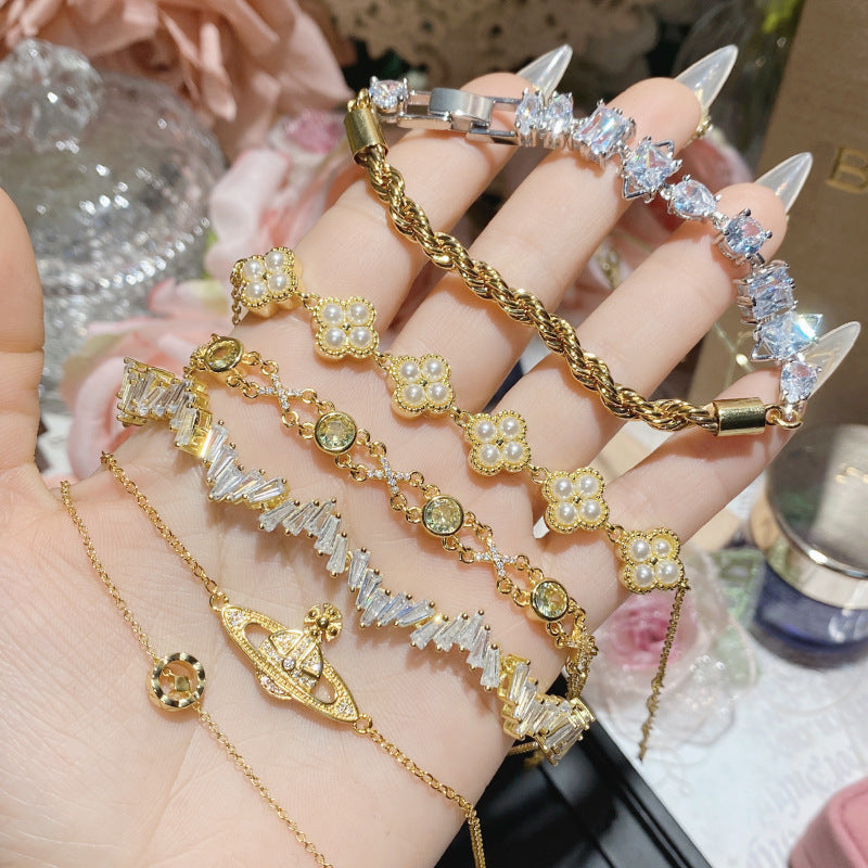 珠宝首饰山茶重工璀璨发光镀18K金不规则手链 微镶满钻经典轻奢精致手链女