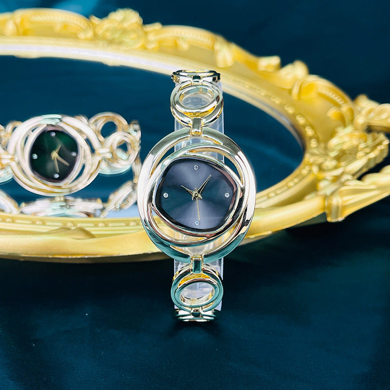 Fashion women's watchCross-Border Foreign Trade Women's Quartz Watch Hollow Flower Rhinestone Bracelet Watch Special Interest Light Luxury All-Match Women's Watch Wholesale