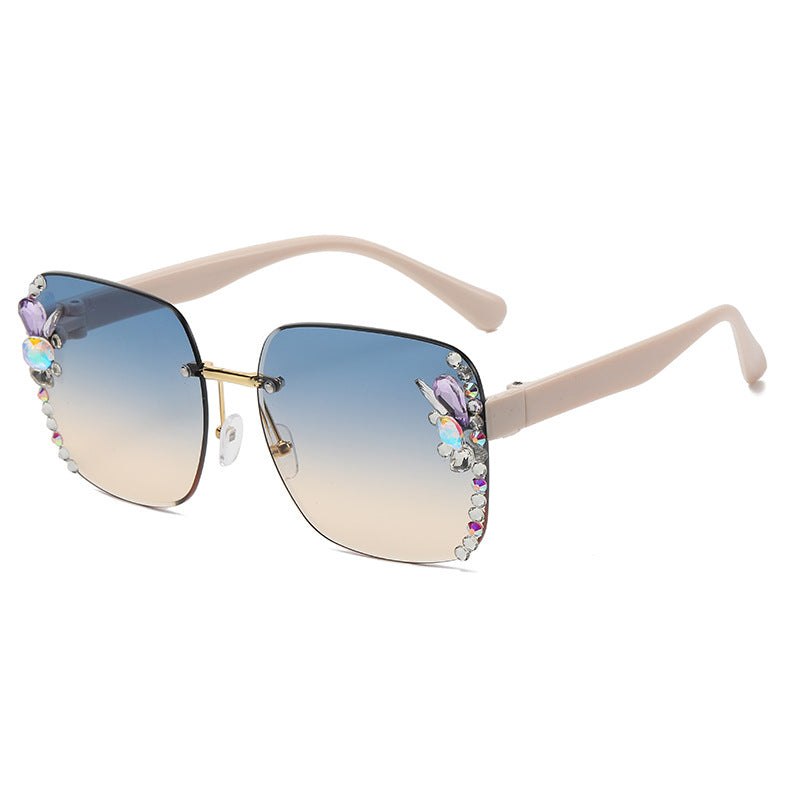 Women's fashion glasses 2023跨境欧美无框切边女士镶钻太阳镜时尚大框遮阳防紫外线墨镜批