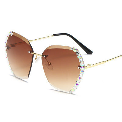 Women's fashion glasses 新款墨镜女韩版潮无框水晶切边太阳眼镜女士防紫外线镶钻太阳镜