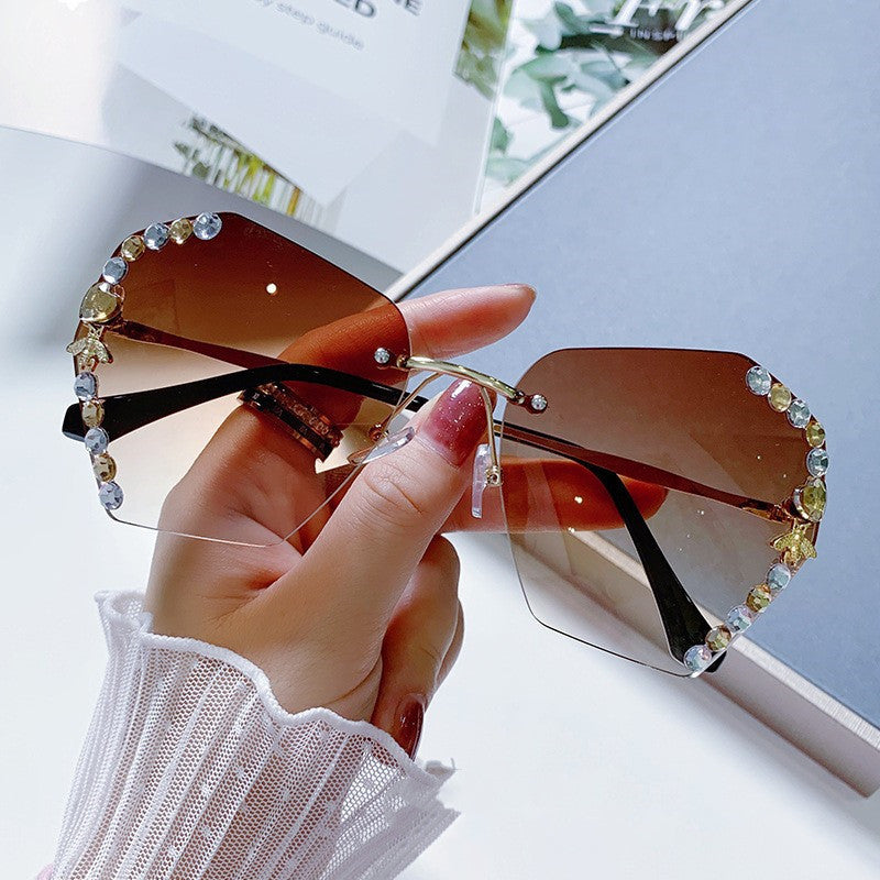 Women's fashion glasses 网红带钻墨镜女2022小蜜蜂水钻无框大脸显瘦太阳眼镜女防紫外线