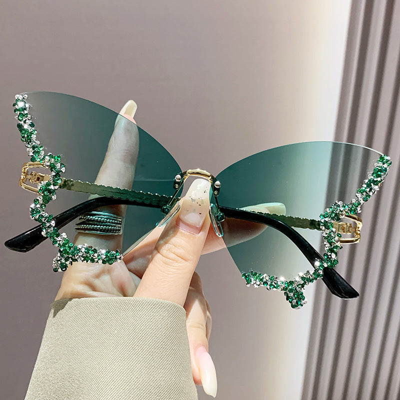 Women's fashion glasses 跨境2024新款蝴蝶形状镶钻无框太阳镜女时尚个性夸张墨镜欧美网红