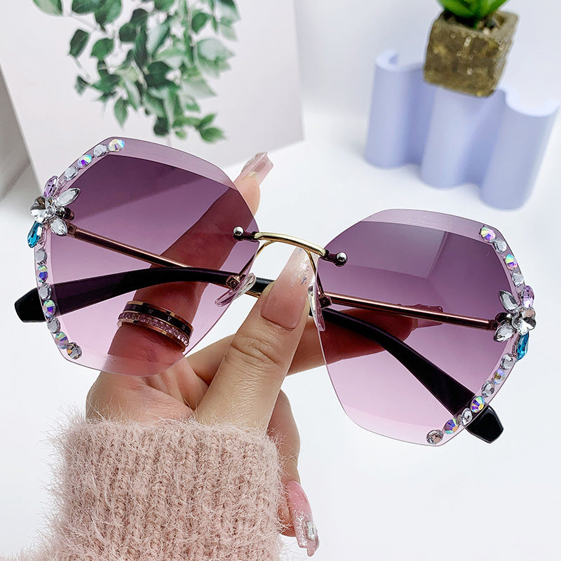 Women's fashion glasses 跨境新款水钻墨镜女显瘦无框切边太阳镜网红潮款防紫外线韩版眼镜