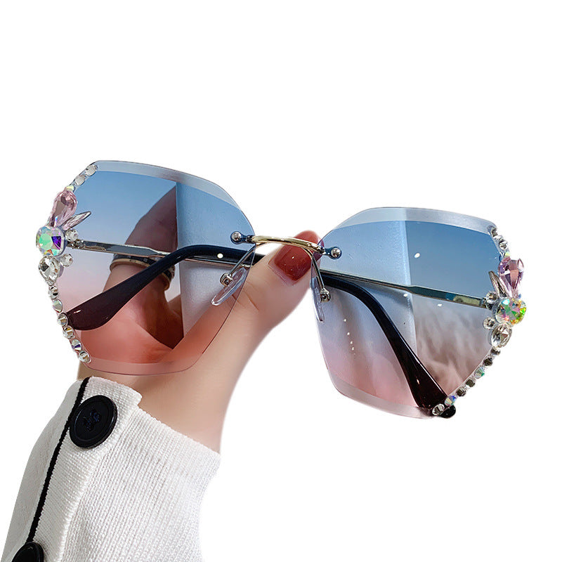 Women's fashion glasses 2024新跨境女士时尚镶钻墨镜大脸显瘦防紫外线水晶切边无框太阳镜