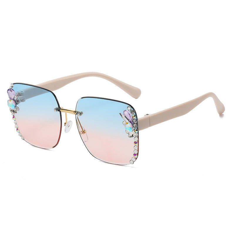 Women's fashion glasses 2023跨境欧美无框切边女士镶钻太阳镜时尚大框遮阳防紫外线墨镜批