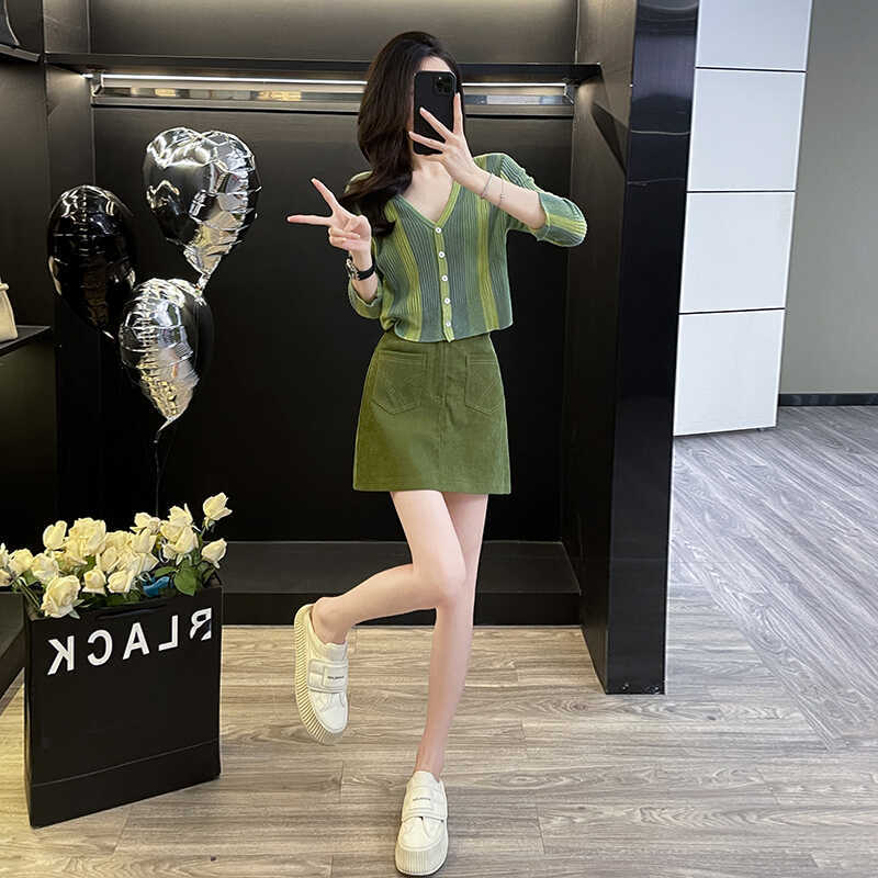 Dopamine dress Free shipping Tattoo Korean version of dopamine wear fashion temperament autumn new women's clothing knitted cardigan long sleeve green high waist short skirt tide