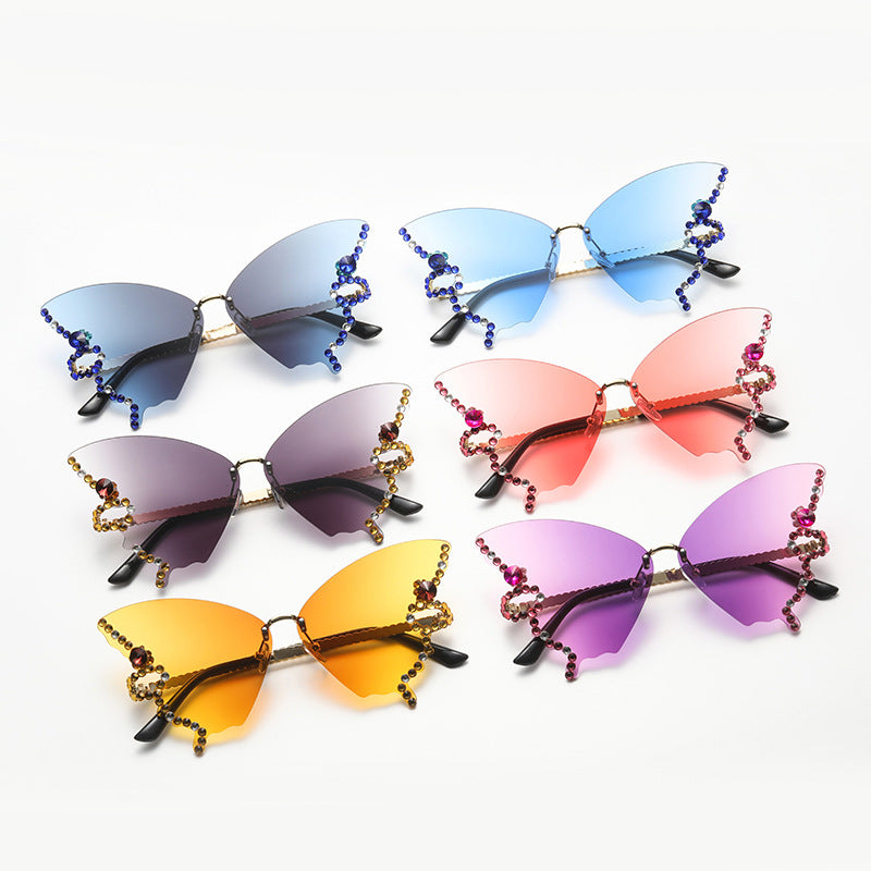 Women's fashion glasses 跨境2023新款蝴蝶形状镶钻无框太阳镜女时尚个性夸张墨镜欧美网红