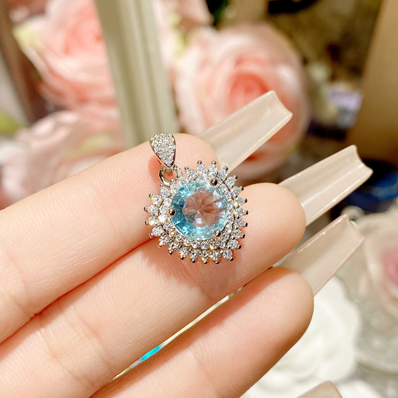 珠宝首饰山茶托帕人造海蓝宝吊坠女 镀18K金多切面锆鸽蛋璀璨闪耀复古项链