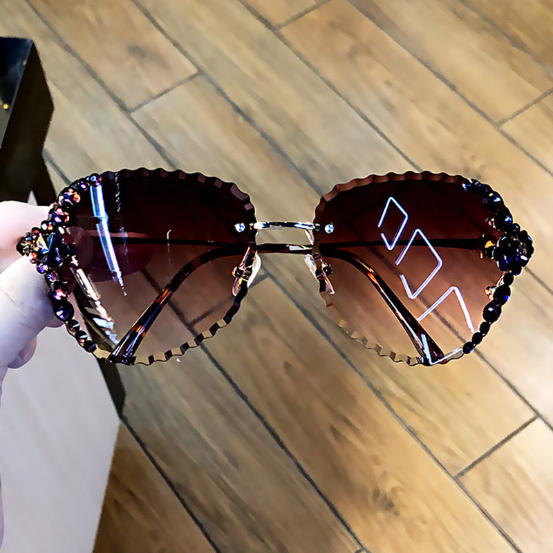 Women's fashion glasses 2021跨境网红ins墨镜女镶钻韩版潮个性水晶无框防紫外线太阳镜女