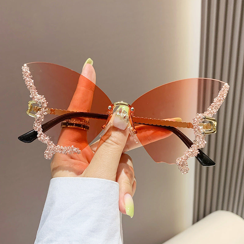 Women's fashion glasses 新款跨境大框蝴蝶镶钻无框太阳镜女ins时尚个性拍照墨镜夸张舞会