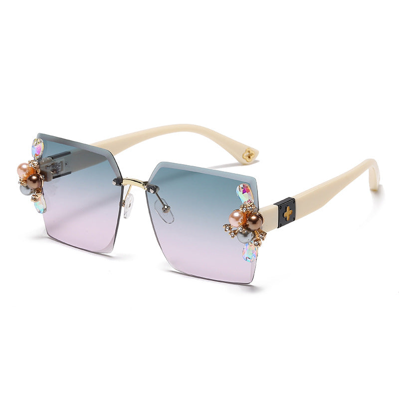Women's fashion glasses 2023跨境无框切边镶珍珠太阳镜女防紫外线墨镜夏季防晒高级感显瘦