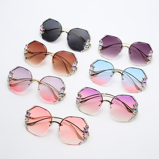 WWomen's fashion glasses 2024 跨境新款时尚镶钻无框切边太阳镜女潮款防紫外线显瘦太阳镜
