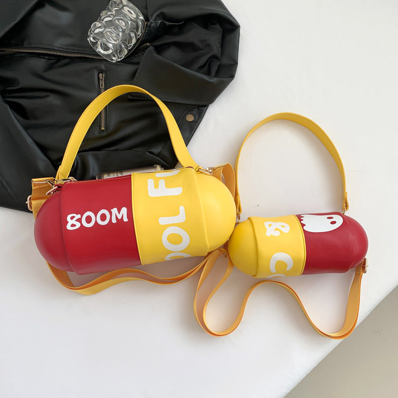 Dopamine Bag Free shipping Tattoo Women's bag new dopamine contrasting color trend cylindrical capsule bag European and American style personality funny single shoulder oblique span bag