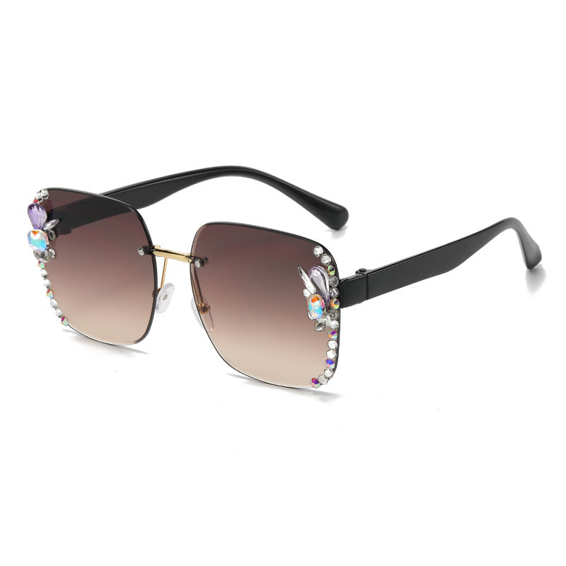 Women's fashion glasses 2023跨境欧美无框切边女士镶钻太阳镜时尚大框遮阳防紫外线墨镜批