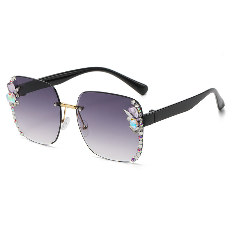 Women's fashion glasses 2023跨境欧美无框切边女士镶钻太阳镜时尚大框遮阳防紫外线墨镜批