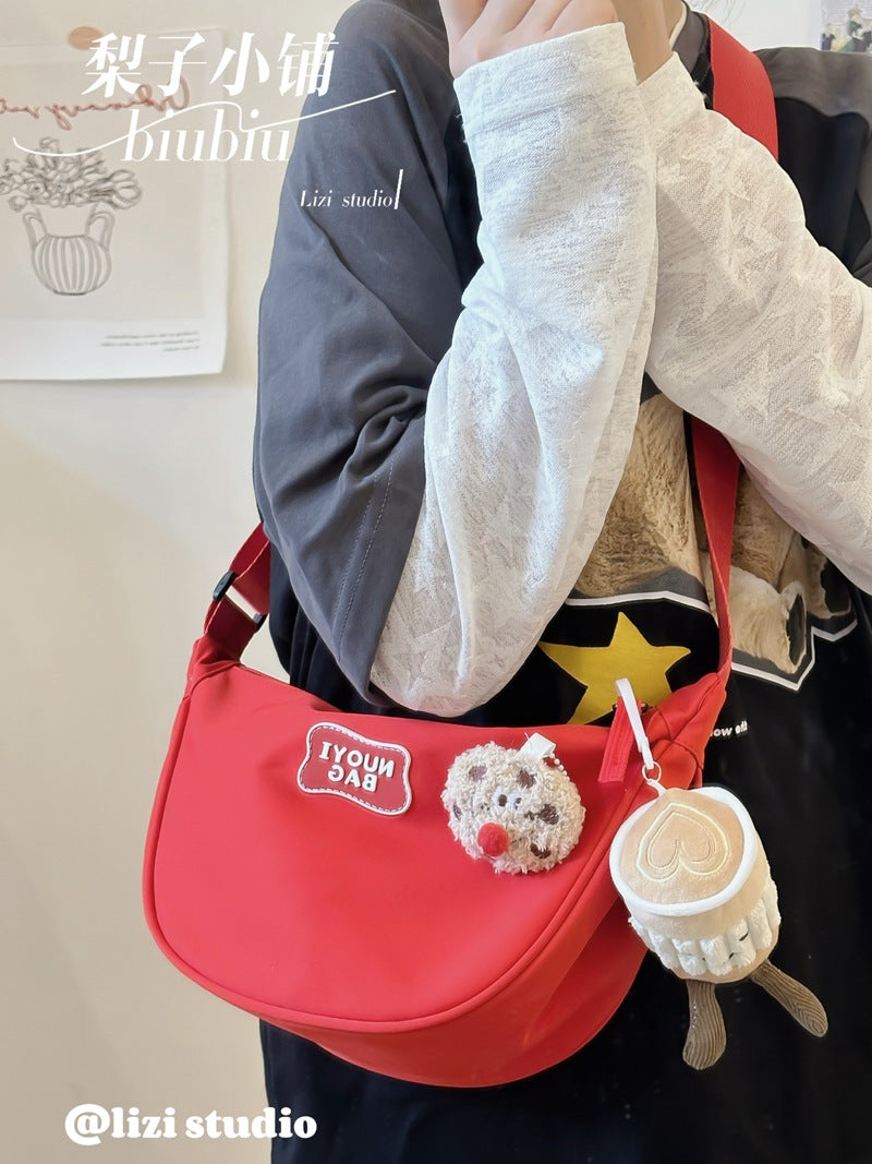 Dopamine Bag Free shipping Tattoo Crescent bag Crossbody bag Women's dopamine niche design Nylon cloth dumpling bag Wide shoulder strap Casual shoulder bag