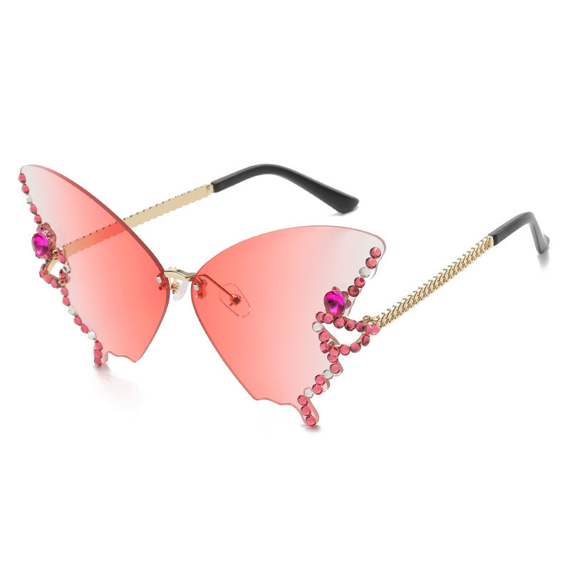 Women's fashion glasses 跨境2023新款蝴蝶形状镶钻无框太阳镜女时尚个性夸张墨镜欧美网红