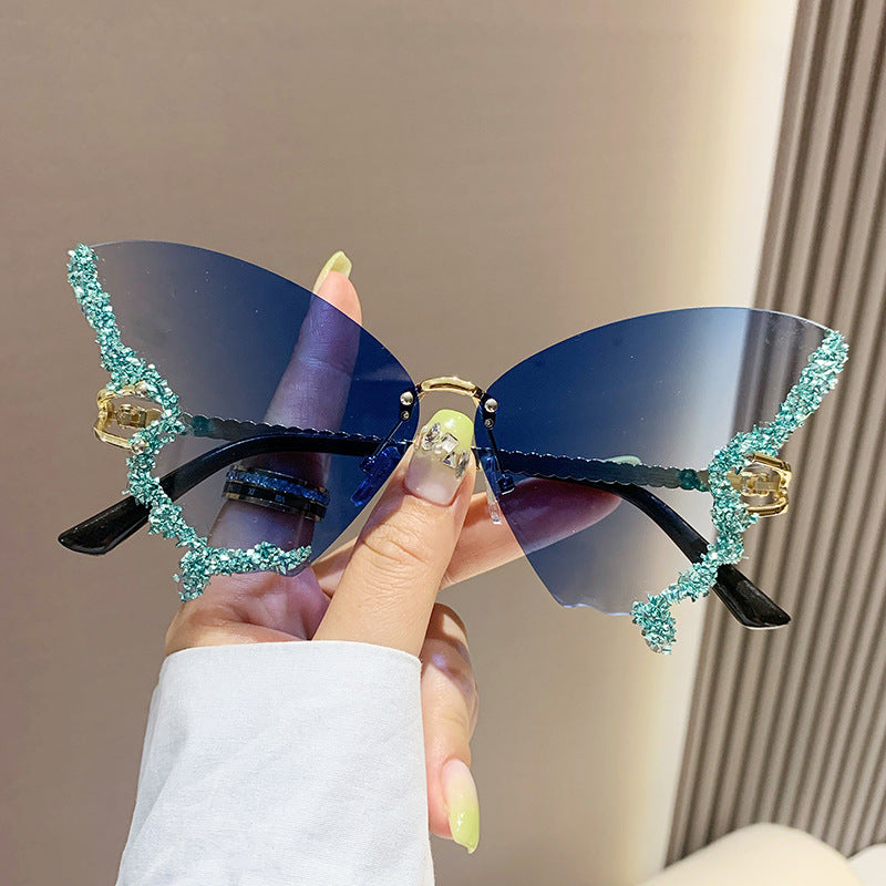 Women's fashion glasses 新款跨境大框蝴蝶镶钻无框太阳镜女ins时尚个性拍照墨镜夸张舞会