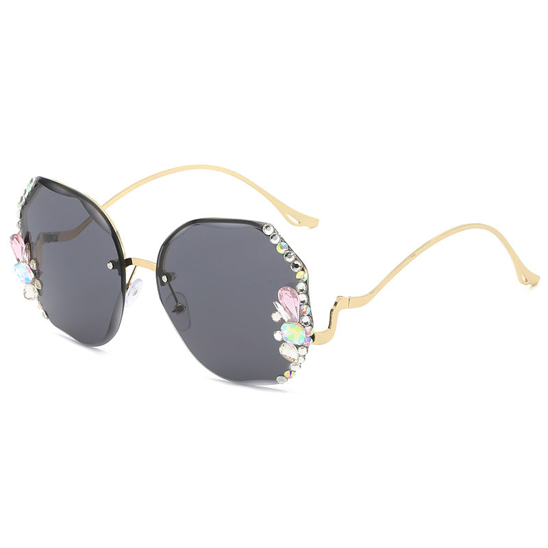 WWomen's fashion glasses 2024 跨境新款时尚镶钻无框切边太阳镜女潮款防紫外线显瘦太阳镜
