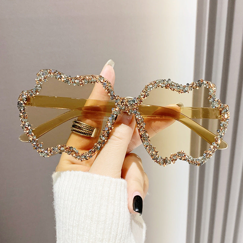 Women's fashion glasses 跨境镶钻透明果冻色苹果太阳镜男女士桃心墨镜欧形连体苹果眼镜