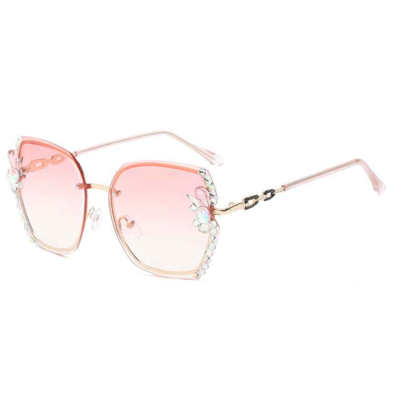 Women's fashion glasses 2022欧美跨境水钻墨镜女钻石切边太阳镜防紫外线奢华海洋片眼镜