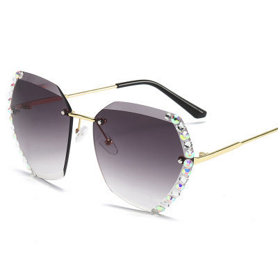 Women's fashion glasses 新款墨镜女韩版潮无框水晶切边太阳眼镜女士防紫外线镶钻太阳镜