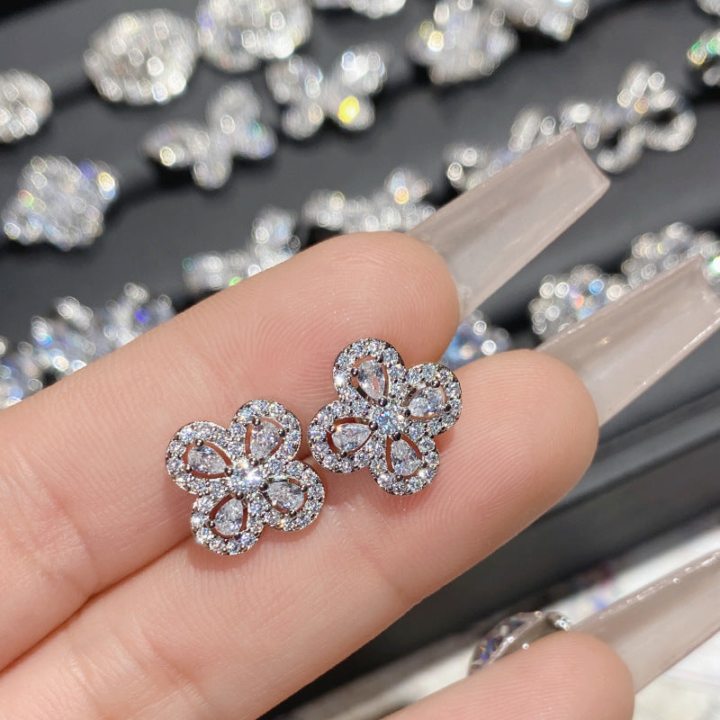 山茶直播货源热卖仿莫桑钻耳钉 镀18K金波光粼粼玫瑰花朵女神耳饰