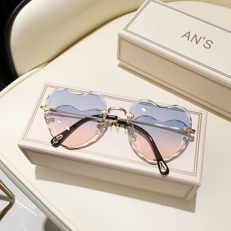 Women's fashion glasses 2024  墨镜桃心女ins无框爱心搞怪链条款 防紫外线眼睛网红太阳镜女带链