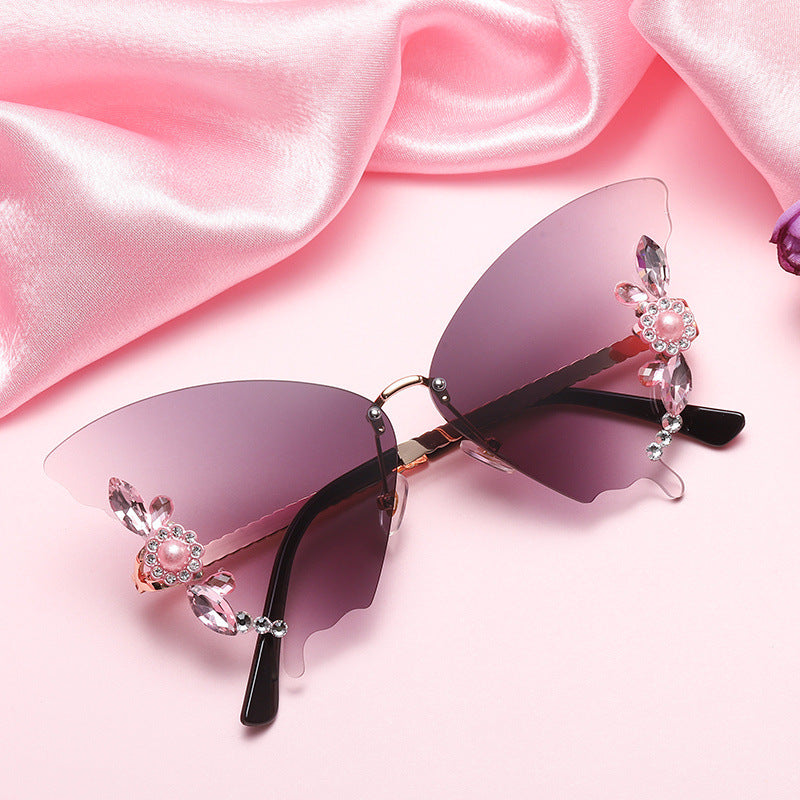 Women's fashion glasses 欧美跨境新款舞会蝴蝶形状镶钻无框太阳镜女夸张墨镜女圆脸大脸
