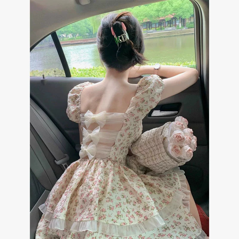Fashion women's wear Small French Sweet Floral Puff Sleeve Dress Female Summer New Backless Hollow Bow Bubble Skirt