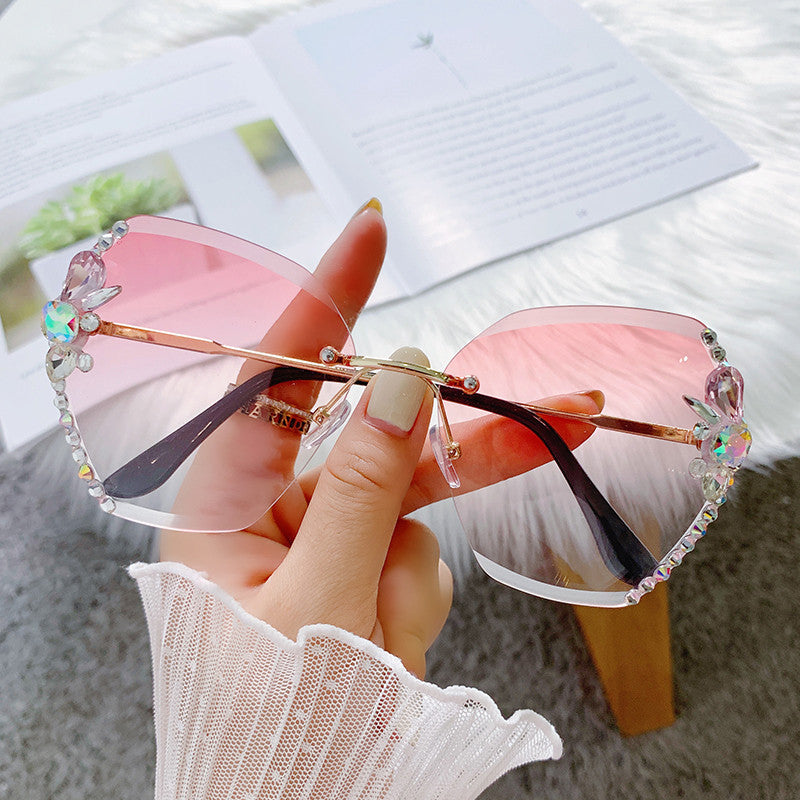Women's fashion glasses 2024 跨境新款无框多边形镶钻花朵太阳镜女圆脸大脸 不规则墨镜女