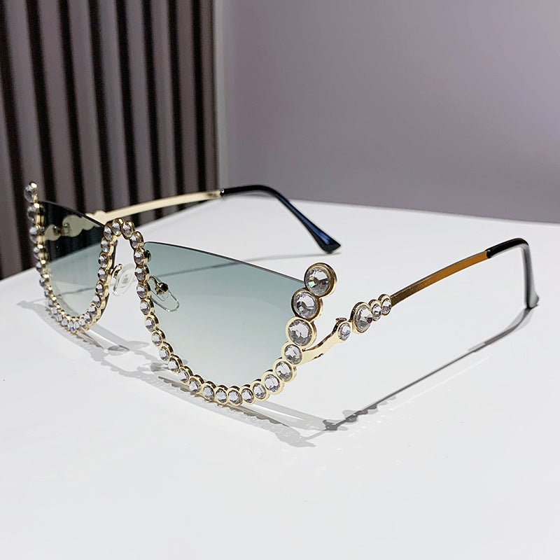 Women's fashion glasses 欧美镶钻大框架跨境水钻墨镜女异形波浪切边眼镜防晒显瘦太阳镜