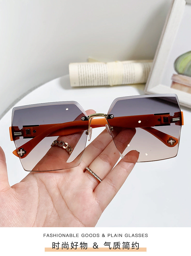 Women's fashion glasses 跨境新款四叶草女士太阳镜潮流抖音无框切边墨镜时尚开车旅游眼镜