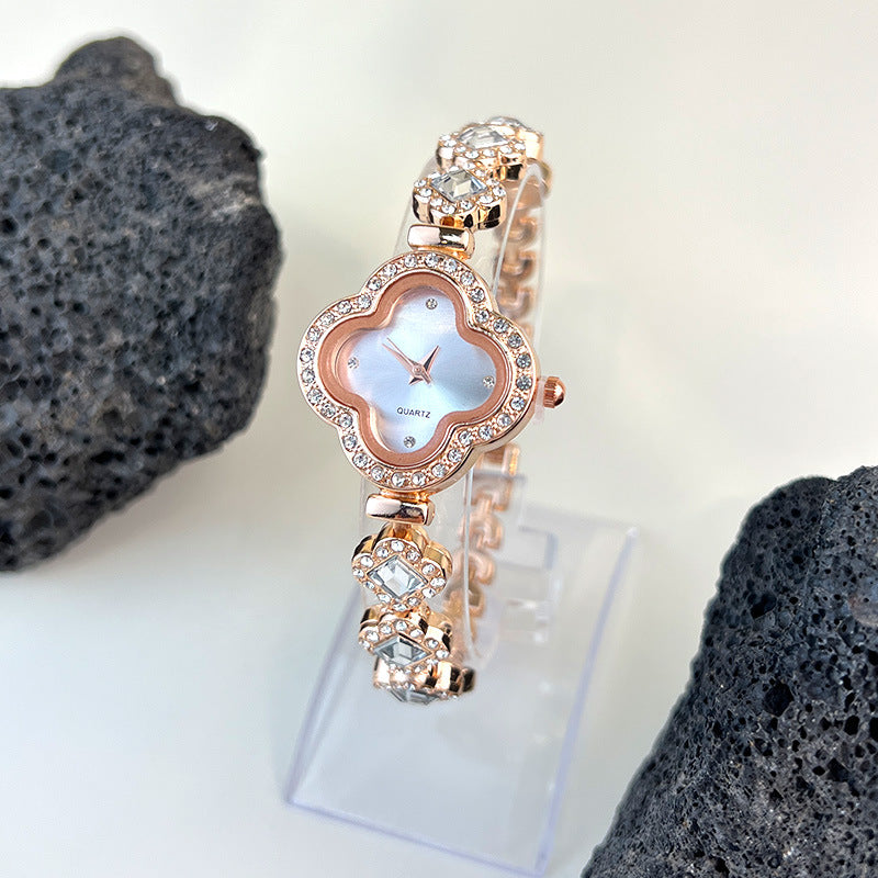 Fashion women's watchLight Luxury Women's Watch New Four-Leaf Clover Fashion High Sense New Ruby Special-Interest Design Diamond Watch Batch