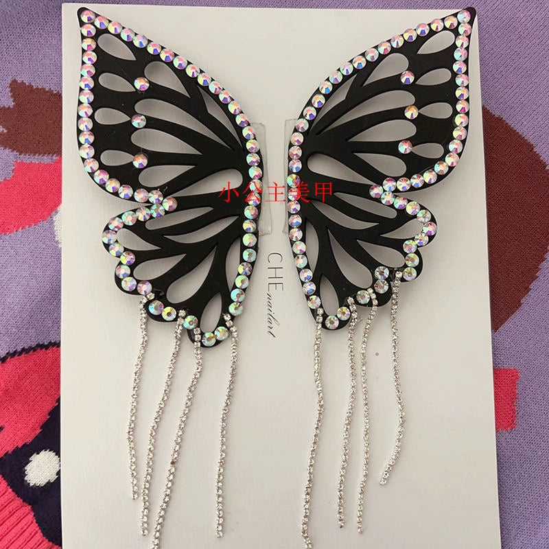 (Hand-made nail) Super-large and exaggerated butterflies wear nail art Camellia and turn around the butterfly chain in fake nails.