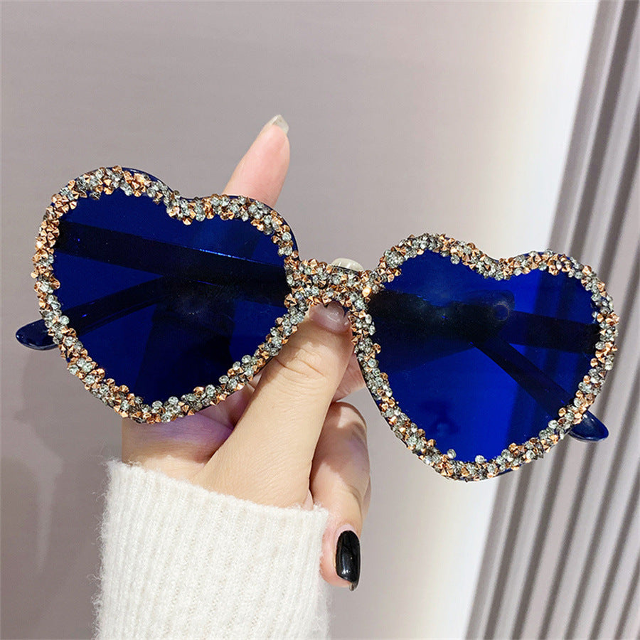 Women's fashion glasses 新款爱心连体镜片无框镶钻猫眼太阳镜跨境时尚女士墨镜桃心渐变色
