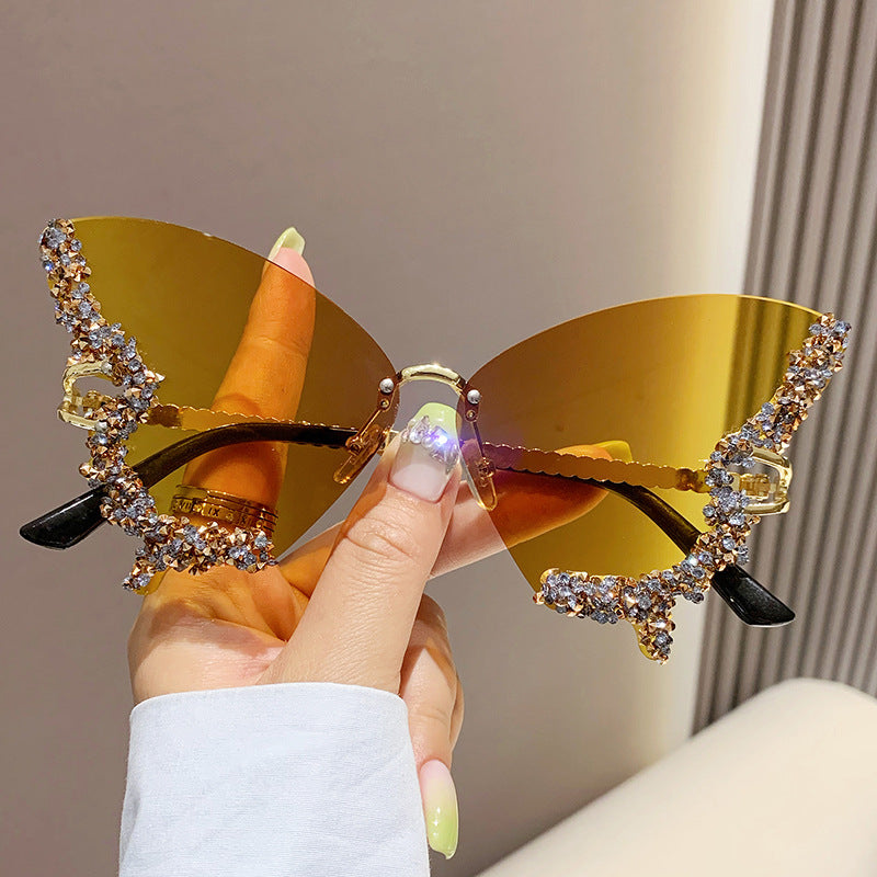 Women's fashion glasses 跨境2024新款蝴蝶形状镶钻无框太阳镜女时尚个性夸张墨镜欧美网红