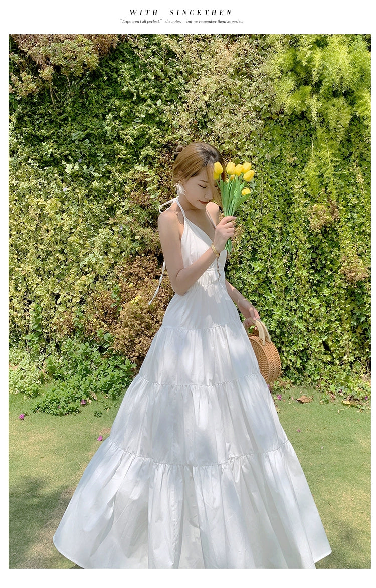 Fashion women's wear Yunnan Travel Photography Fairy Dress Orange Deep V-neck Backless Sling Dress Sanya Seaside Beach Skirt Female