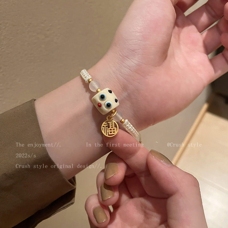 童趣可爱怪兽编织手链女ins小众设计高级感手饰网红闺蜜手绳批发