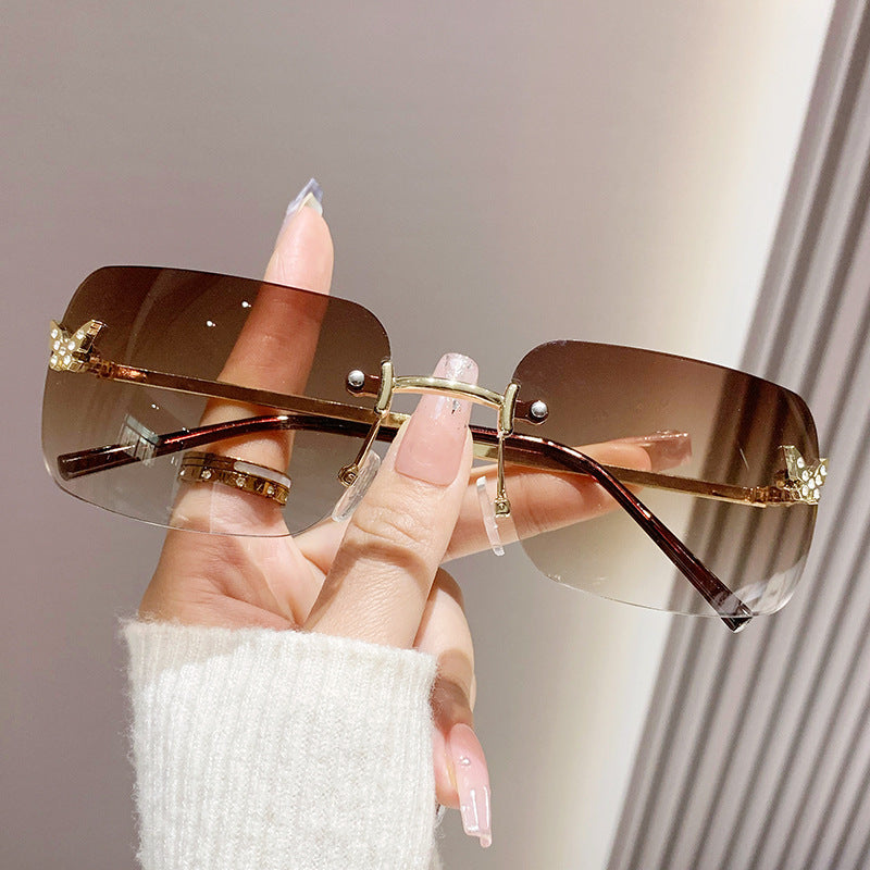Women's fashion glasses 2023新款无框切边太阳镜女海洋片方形镶钻蝴蝶时尚渐变色墨镜街拍