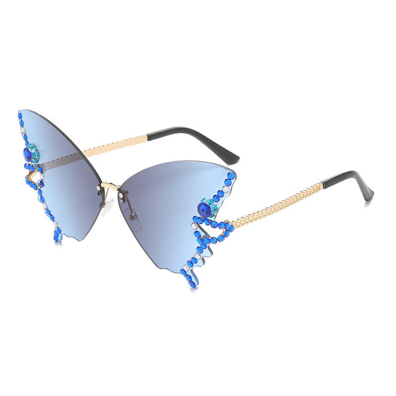 Women's fashion glasses 跨境热销个性无框切边蝴蝶形状镶钻太阳镜高级感时尚走秀搞怪墨镜