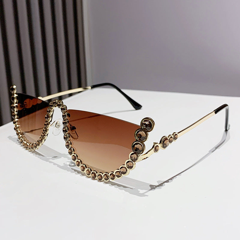 Women's fashion glasses 欧美镶钻大框架跨境水钻墨镜女异形波浪切边眼镜防晒显瘦太阳镜