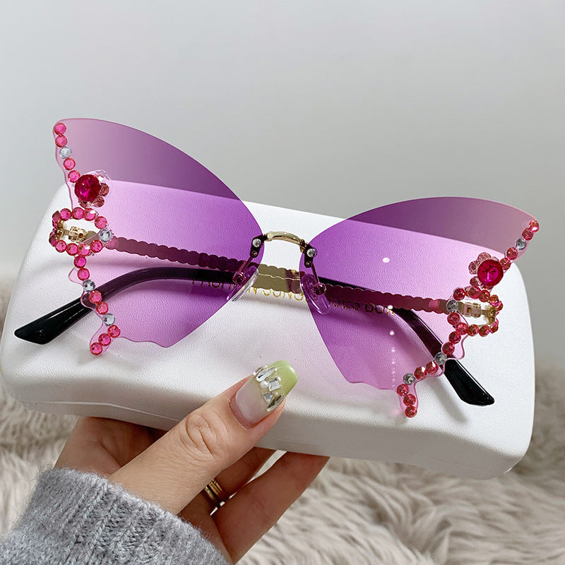 Women's fashion glasses 跨境热销个性无框切边蝴蝶形状镶钻太阳镜高级感时尚走秀搞怪墨镜